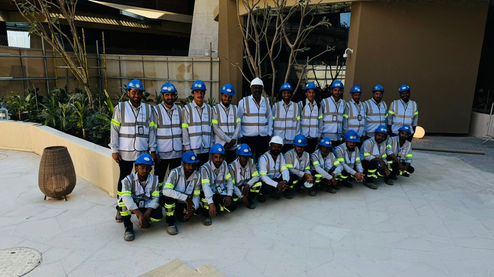 TRAP Pest control employees in front of the company premises